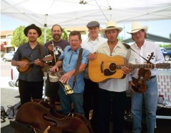 At the Hillcrest Farmers Market in the early days, the 7th Day Buskers were, left to right: Steve Peavey, Dwight Worden, Robin Henkel, Ken Dow, Shawn Rohlf, and Don Hockox