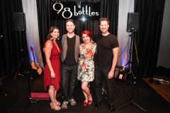 Simeon (right) at 98 Bottles with Rhea Makiaris, Andrew Steele, and Whitney Shay
